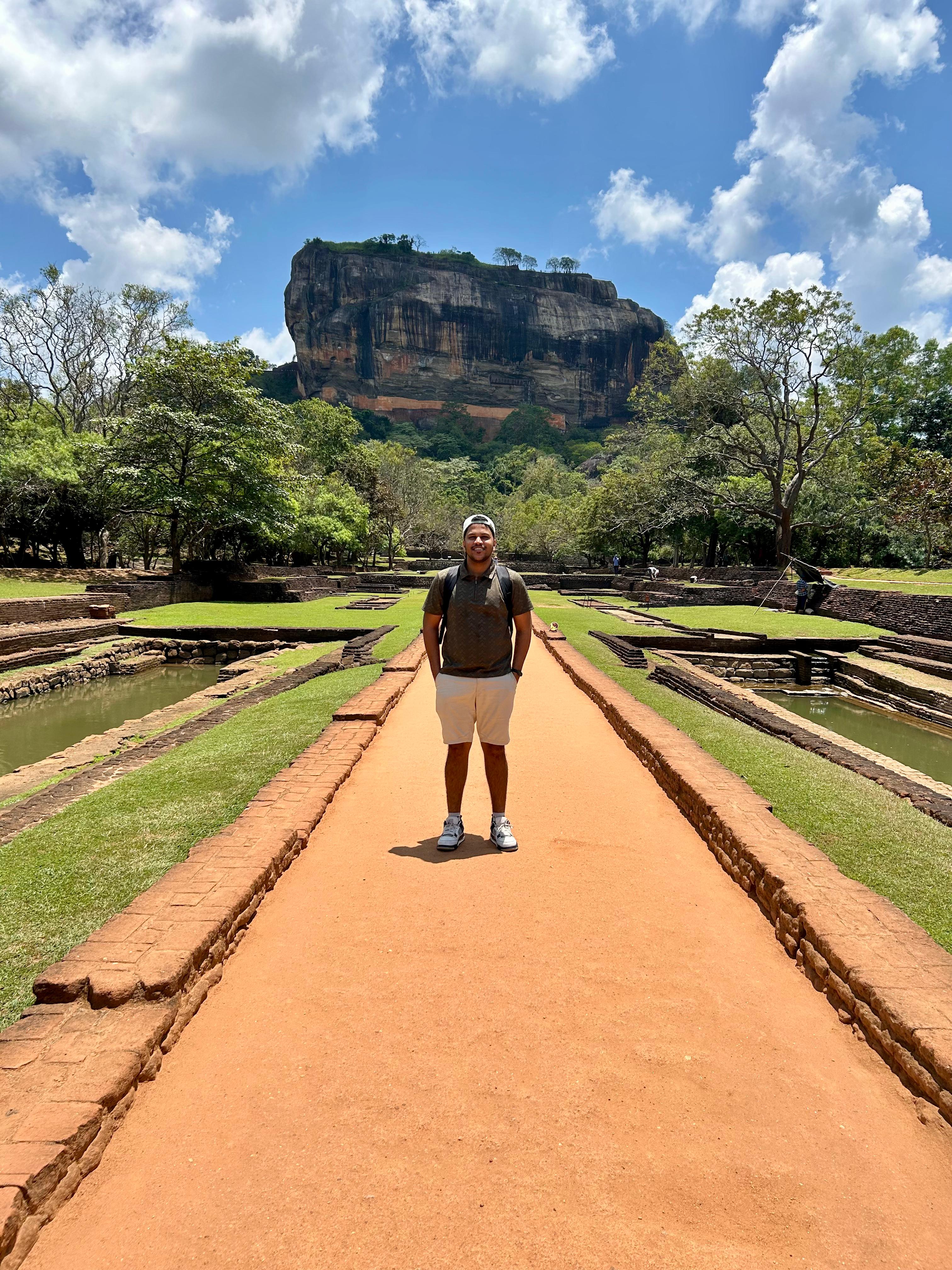 Me taking in the spectacular view of the Sigiriya gardens from the rock edge